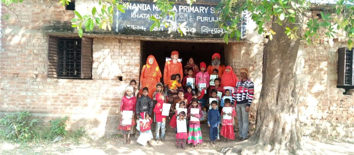Children happily posing for group photo at school
