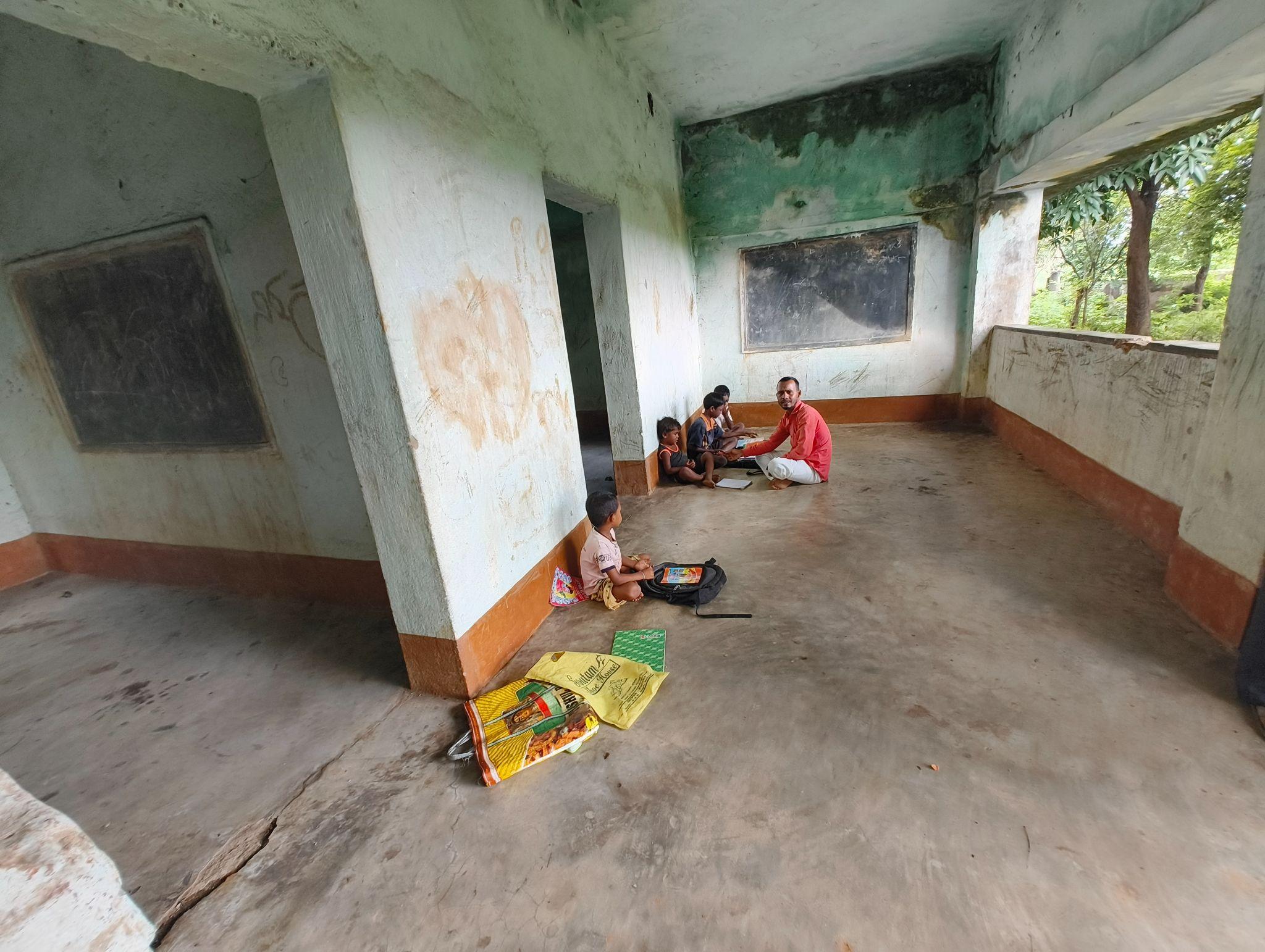 School children gathering under the tree at Bhagudih school campus
